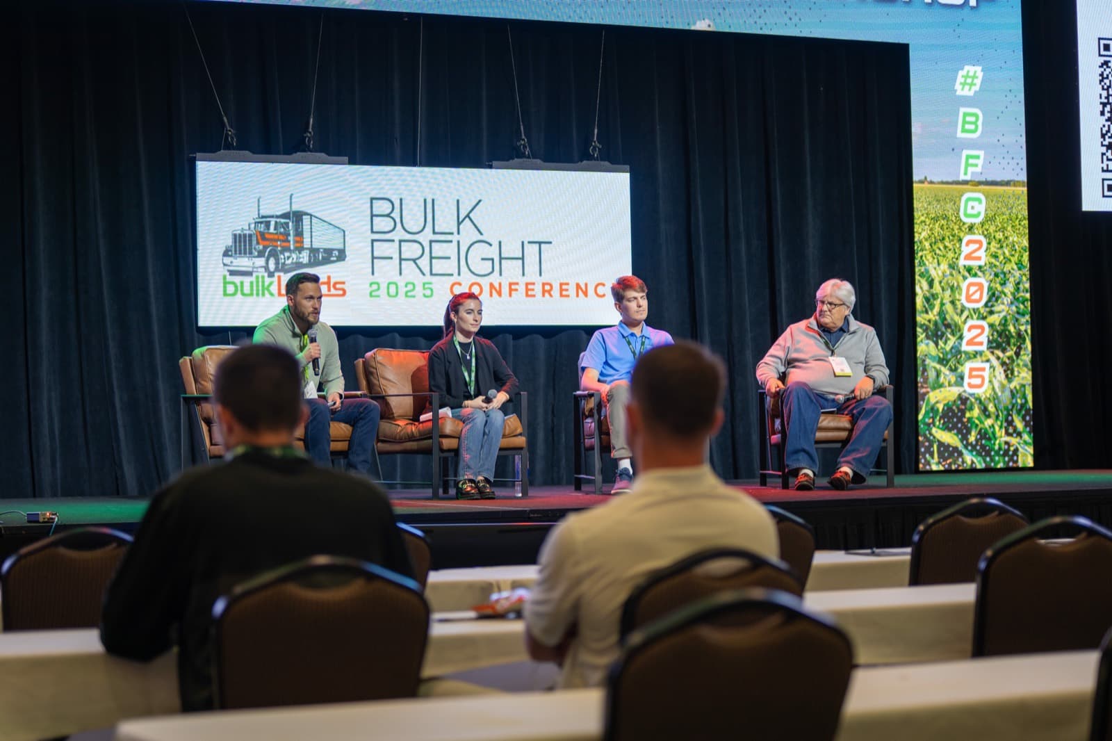 Carriers and brokers answering questions on a main-stage panel